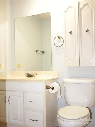 a bathroom with a shower curtain