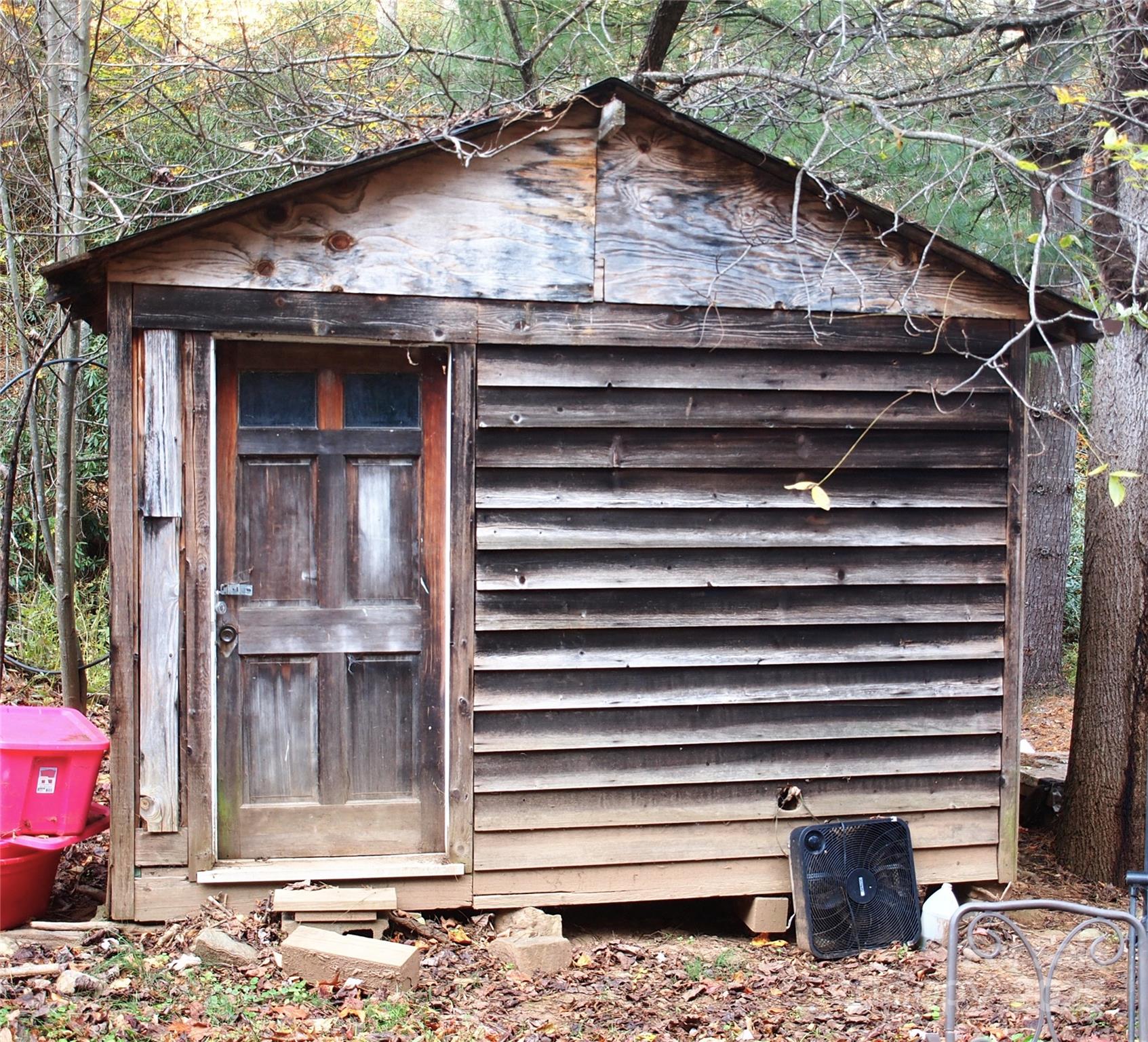 9 Smokey Cove Road Canton, NC 28716 - Photo 23 of 24 a front view of a house with a garden