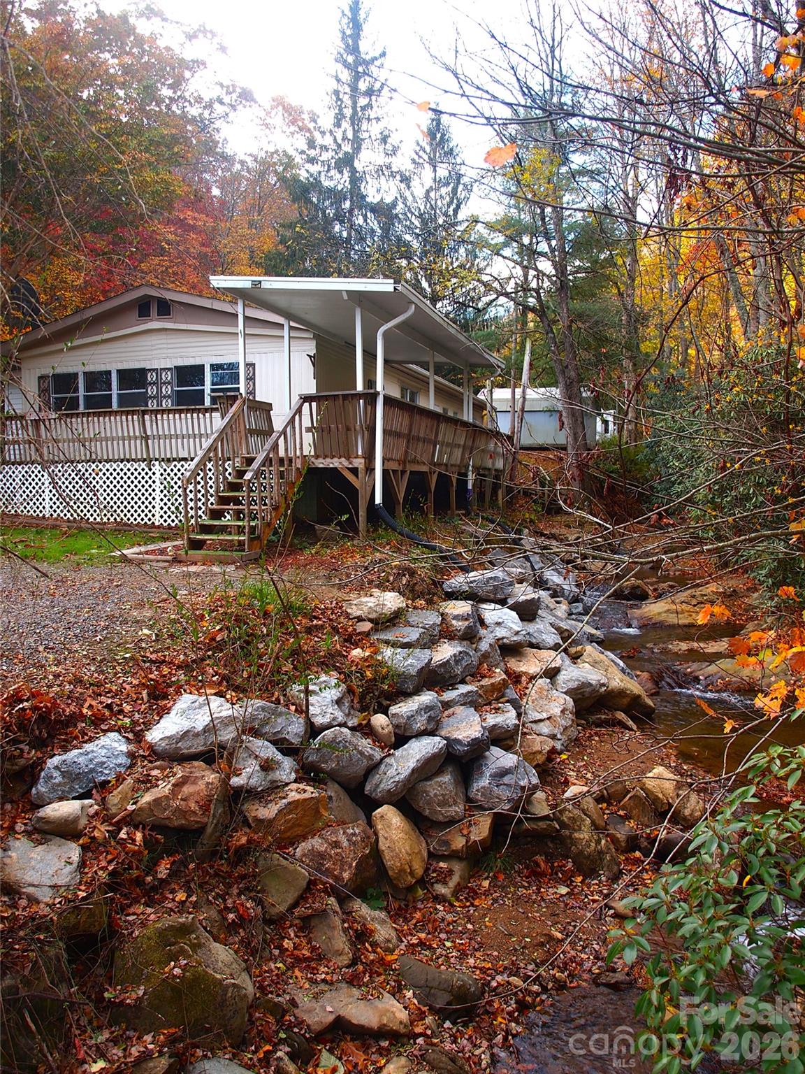 9 Smokey Cove Road Canton, NC 28716 - Photo 4 of 26 a view of house with a yard