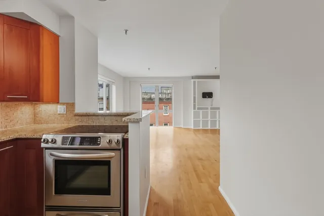 a kitchen with a stove and a microwave