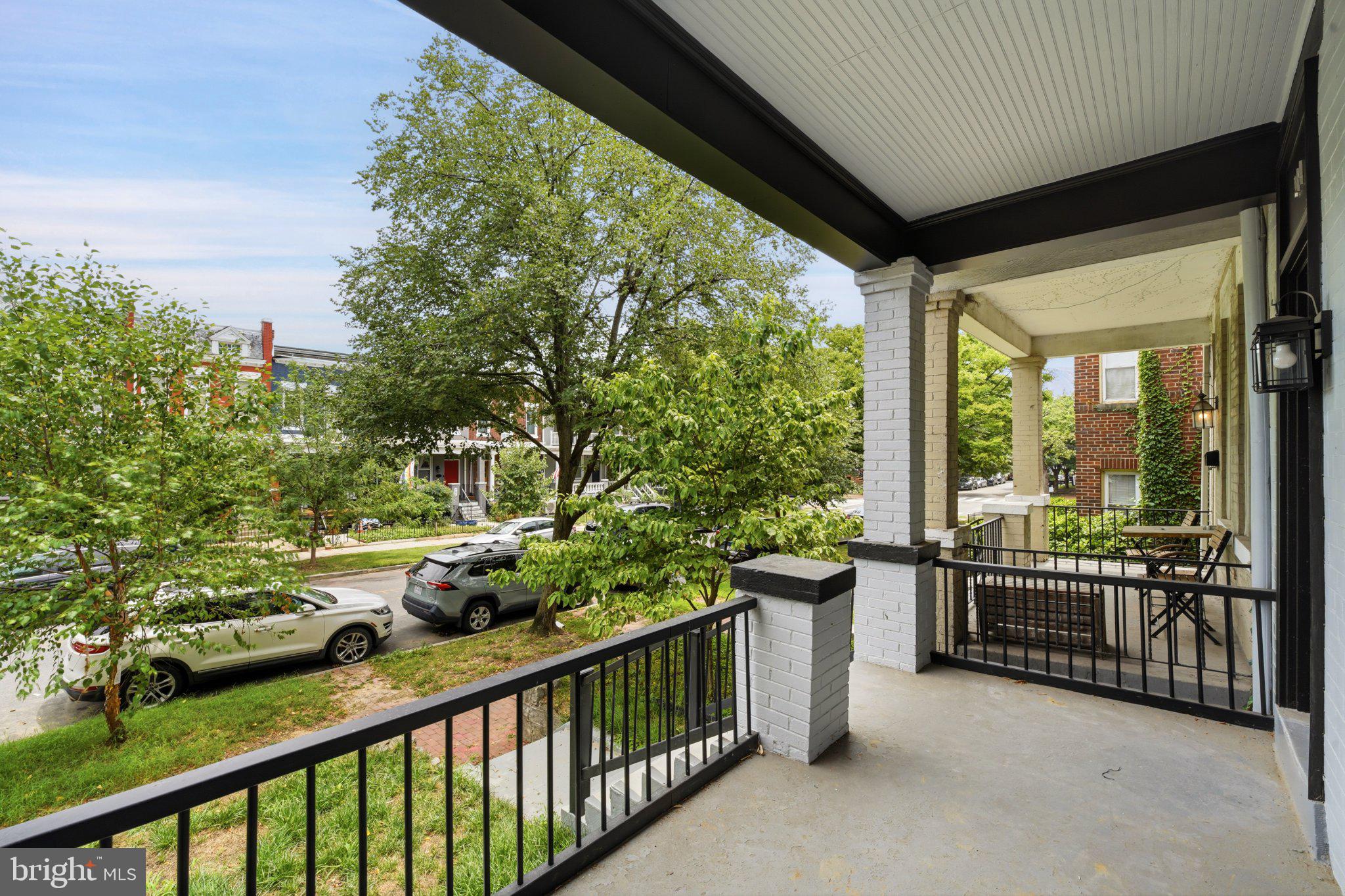 914 5th Street Northeast Washington, DC 20002 - Photo 31 of 36 Charming porch with lush greenery views.