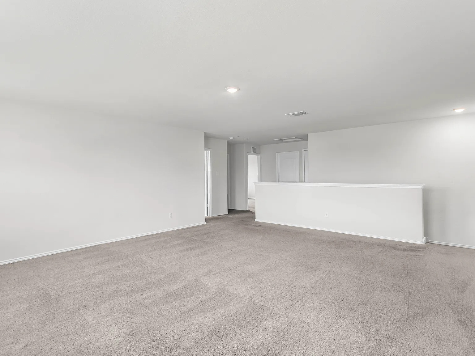 156 Janice Road Taylor, TX 76574 - Photo 17 of 29 Spare room featuring recessed lighting, carpet, visible vents, and baseboards
