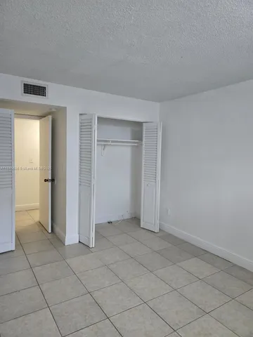 an empty room with a door