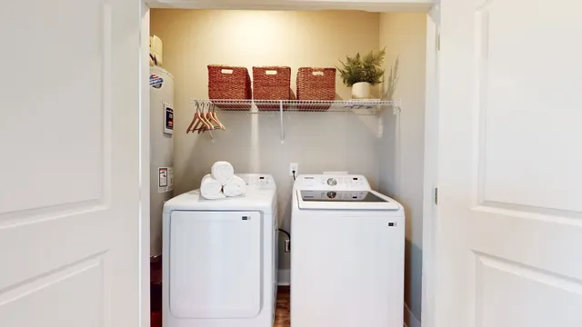 a utility room with dryer and washer