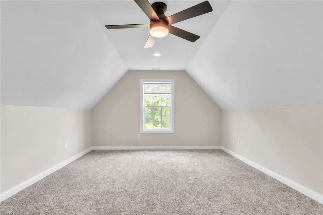 1015 Winmar Drive Anderson, SC 29621 - Photo 27 of 49 Bright and airy, this spacious room features sloped ceilings and ample natural light.