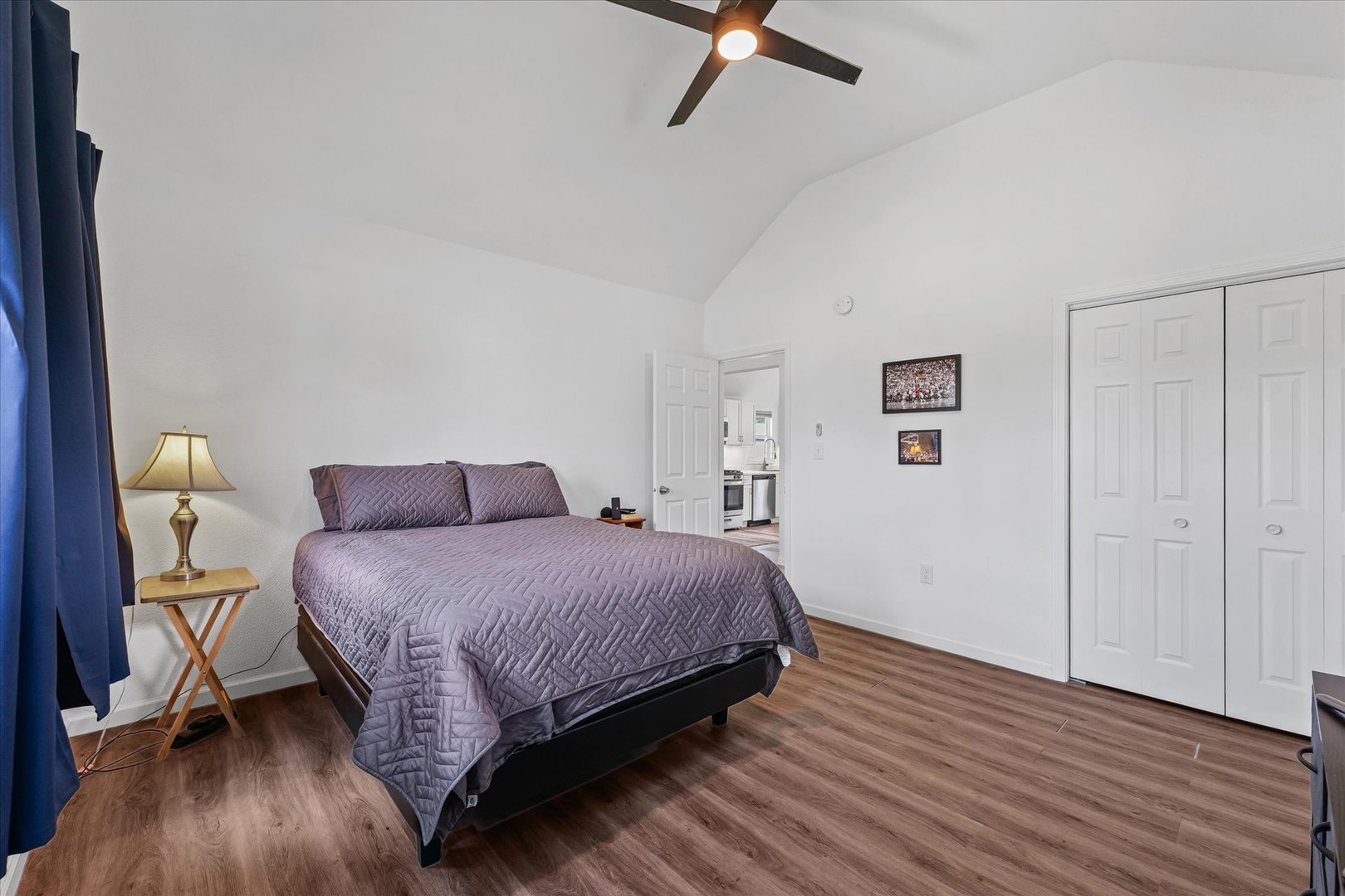 107 Front Street Fisher, IL 61843 - Photo 15 of 25 a bedroom with a bed and wooden floor