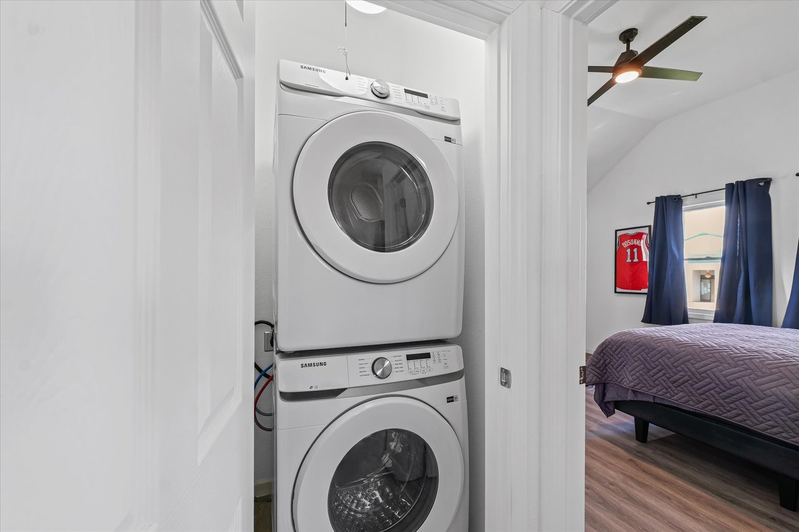 107 Front Street Fisher, IL 61843 - Photo 19 of 25 a bedroom with a washer and dryer