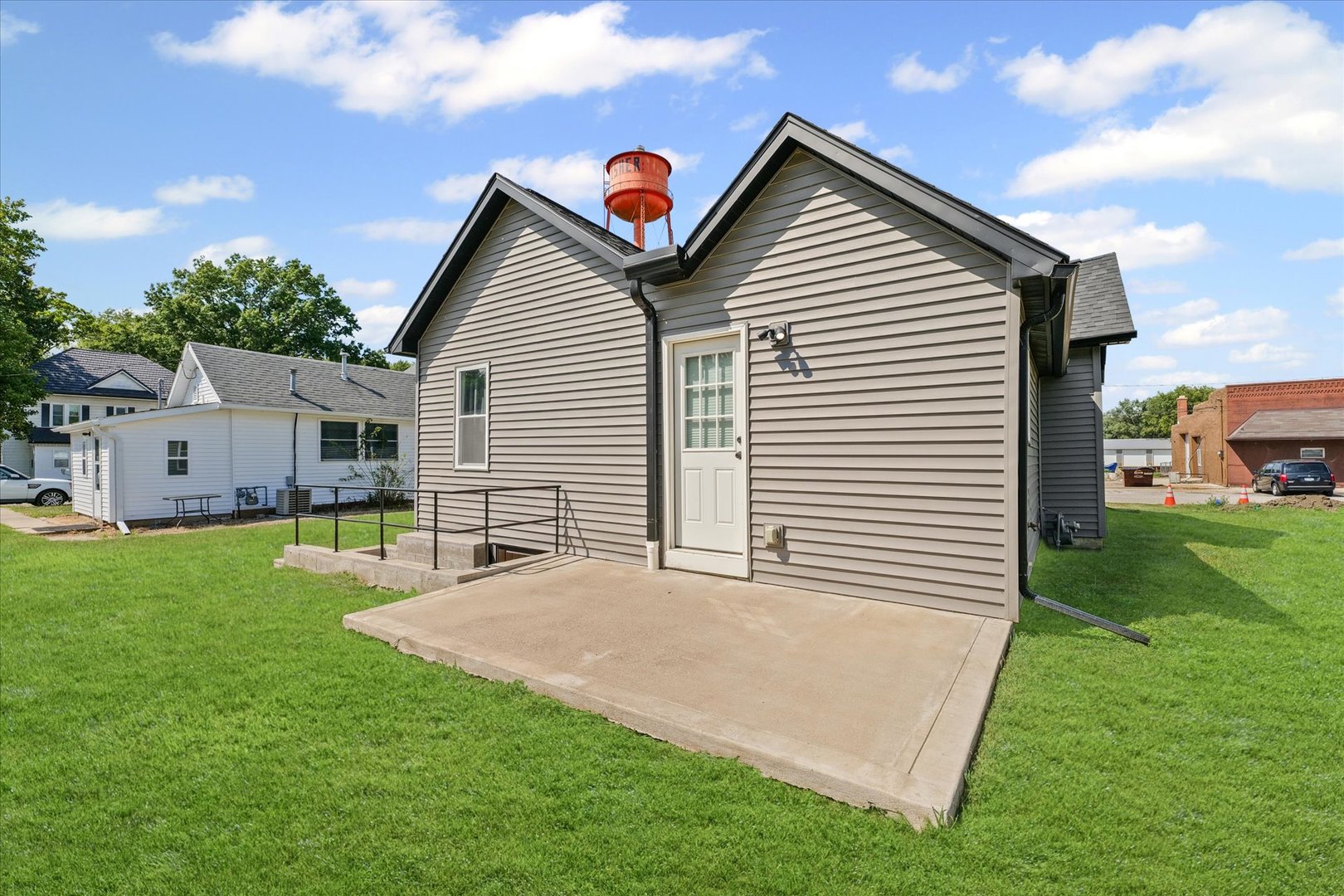 107 Front Street Fisher, IL 61843 - Photo 22 of 25 a view of a house with a yard