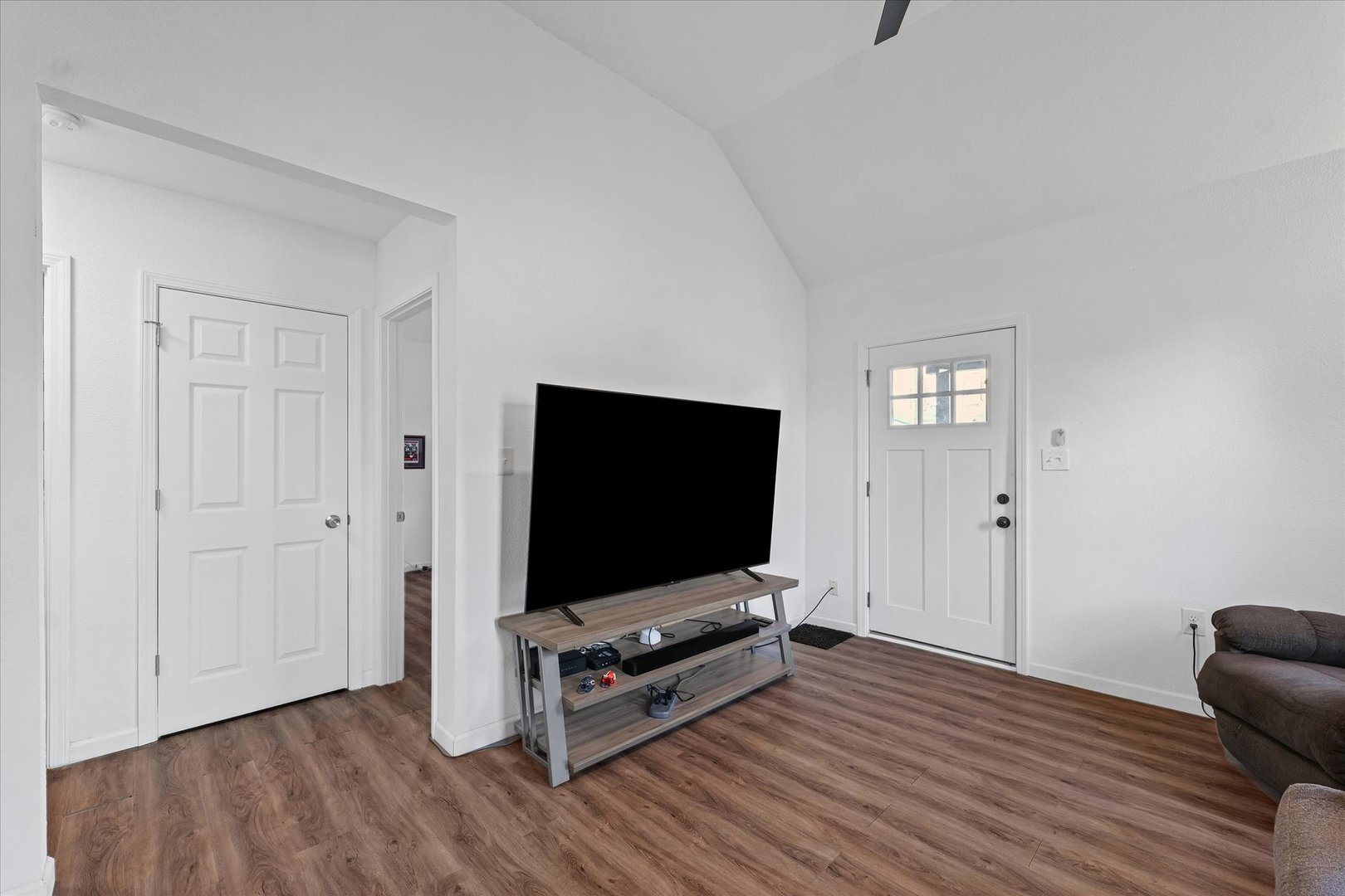 107 Front Street Fisher, IL 61843 - Photo 8 of 25 a living room with furniture and flat screen tv