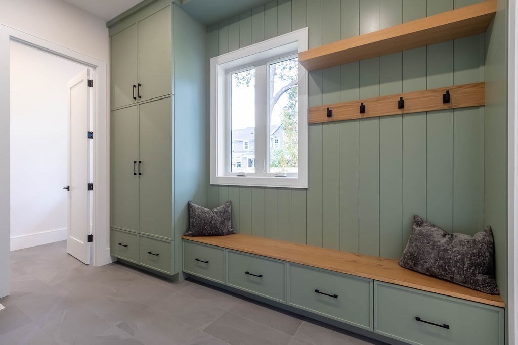 65 Mann Avenue Needham, MA 02492 - Photo 8 of 16 a room with baby crib and window