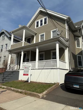 a view of a building with a street