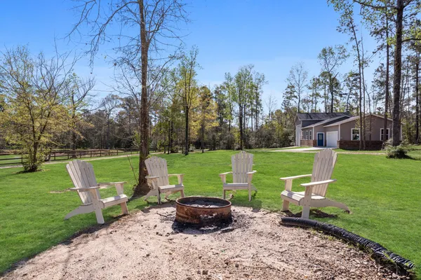 a view of a lake with a big yard