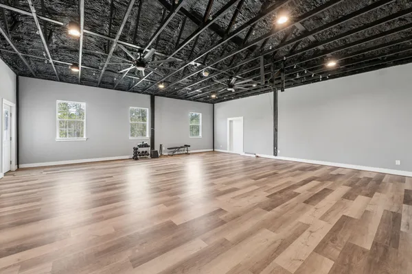 a view of a storage room with gym equipment