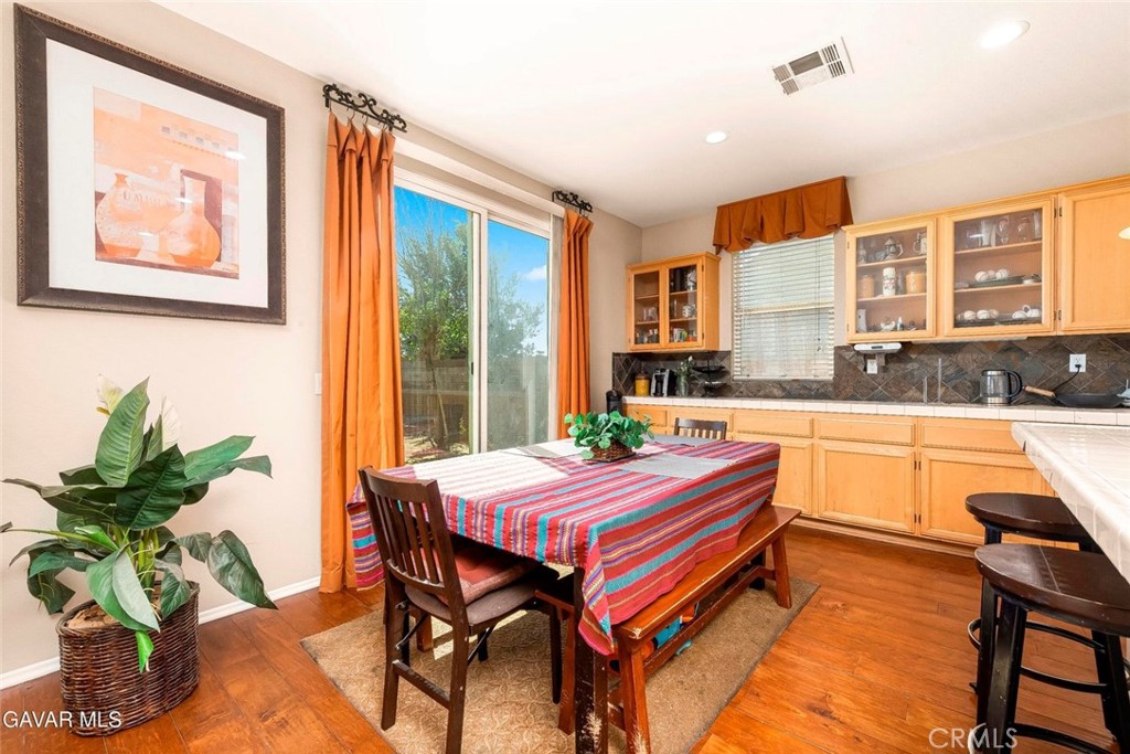 2158 Cypress Street Lancaster, CA 93535 - Photo 11 of 28 a bed room with a bed and a table