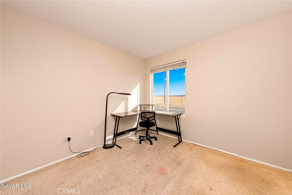 2158 Cypress Street Lancaster, CA 93535 - Photo 18 of 28 a view of a workspace with a window