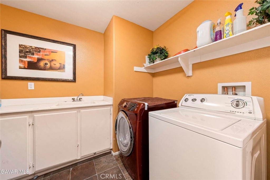 2158 Cypress Street Lancaster, CA 93535 - Photo 22 of 28 a utility room with dryer and washer