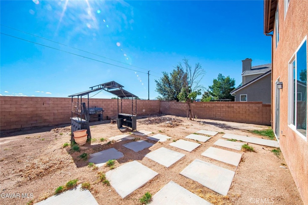 2158 Cypress Street Lancaster, CA 93535 - Photo 26 of 28 a outdoor view with a sitting space