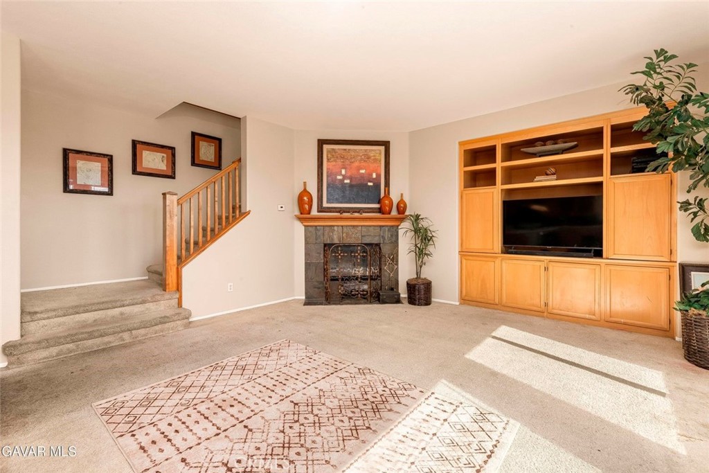 2158 Cypress Street Lancaster, CA 93535 - Photo 7 of 28 a view of a livingroom with an empty space and a fireplace