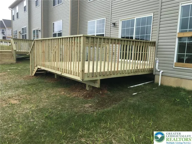 a view of a backyard with a garden