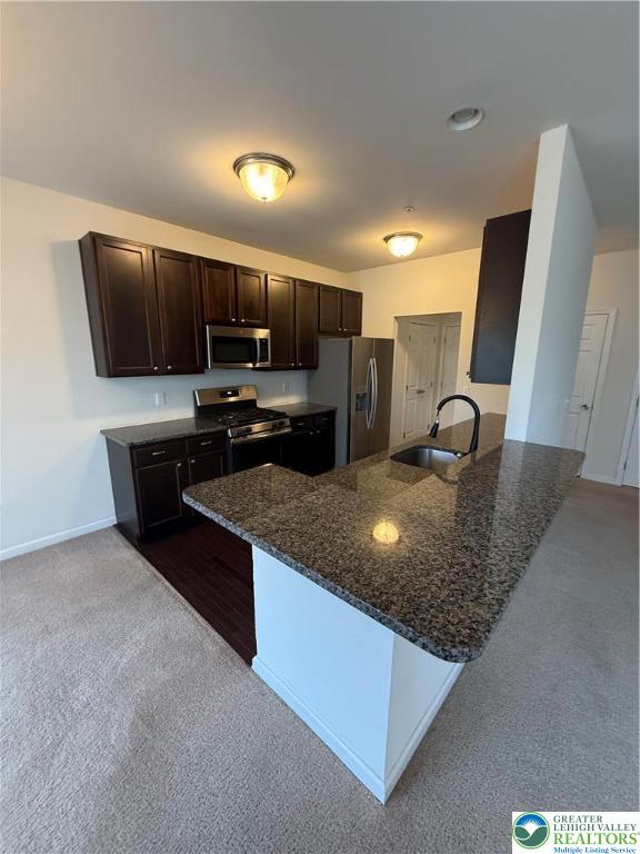5335 Jutland Road Allentown, PA 18104 - Photo 9 of 28 a kitchen with stainless steel appliances granite countertop a sink refrigerator and microwave