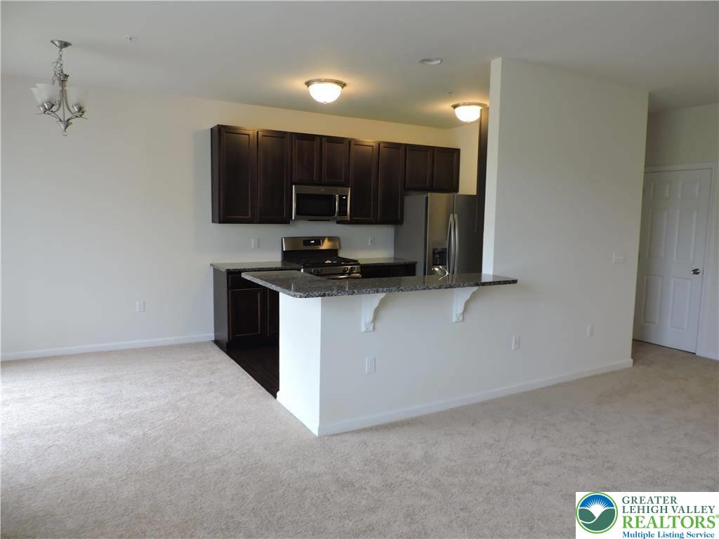 5335 Jutland Road Allentown, PA 18104 - Photo 10 of 28 a kitchen with a sink and a stove top oven