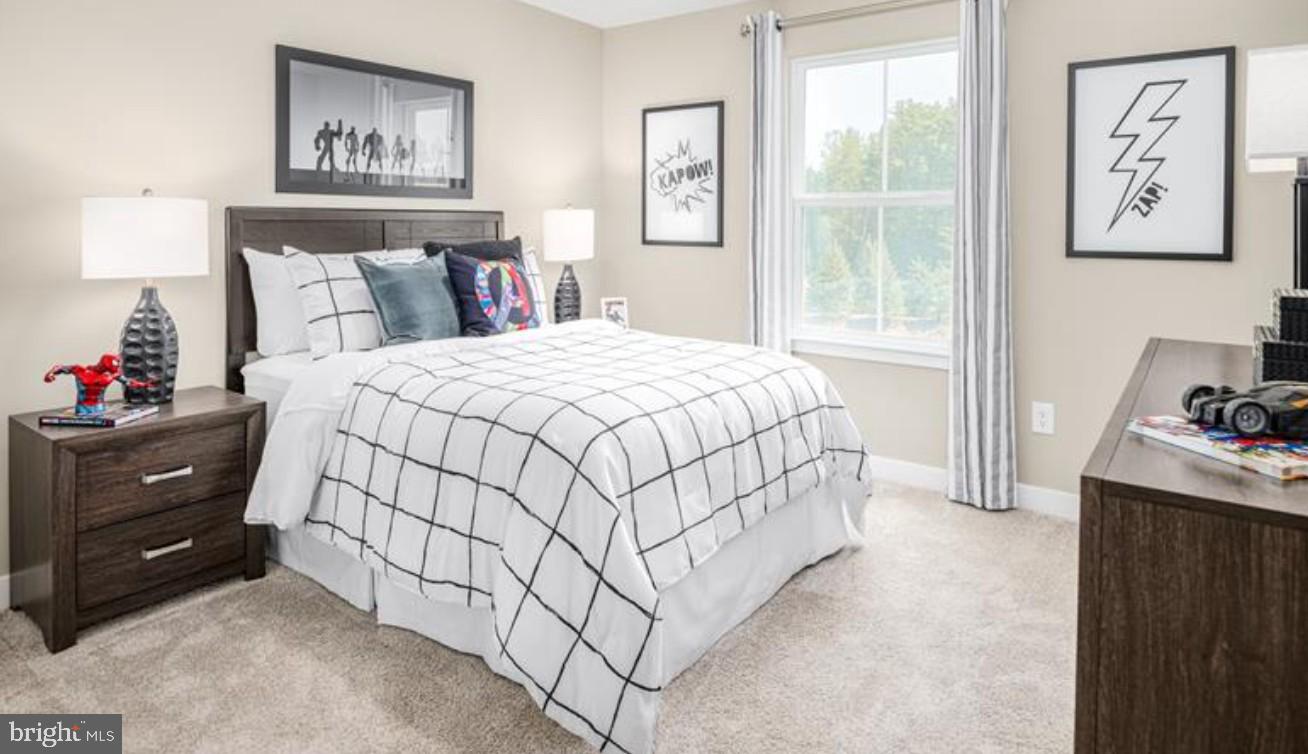 1410 Leeland Forest Road, Unit 25 Upper Marlboro, MD 20774 - Photo 15 of 21 a bedroom with a bed and a window