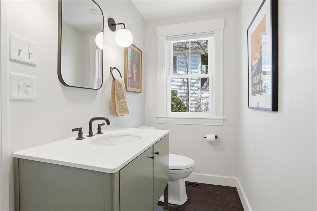 69 Potter Street Concord, MA 01742 - Photo 17 of 31 a bathroom with a sink and a mirror
