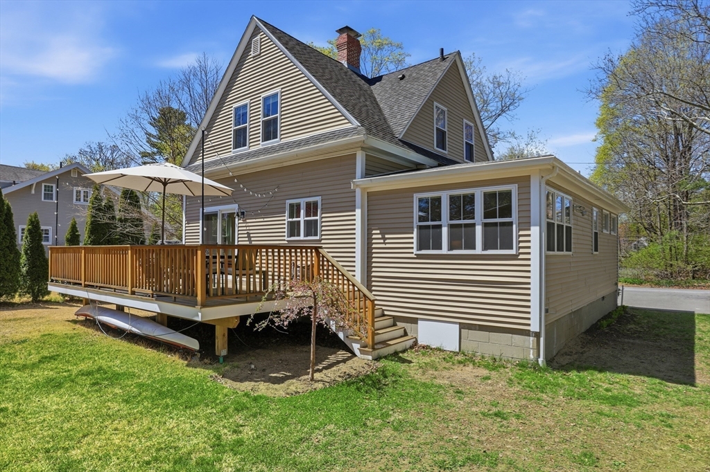 69 Potter Street Concord, MA 01742 - Photo 28 of 31 a view of a house with a yard