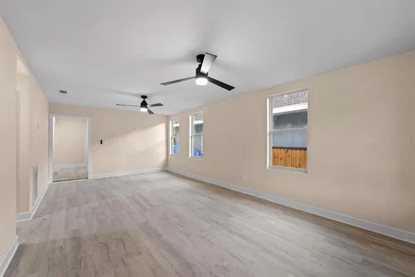 a view of an empty room and window