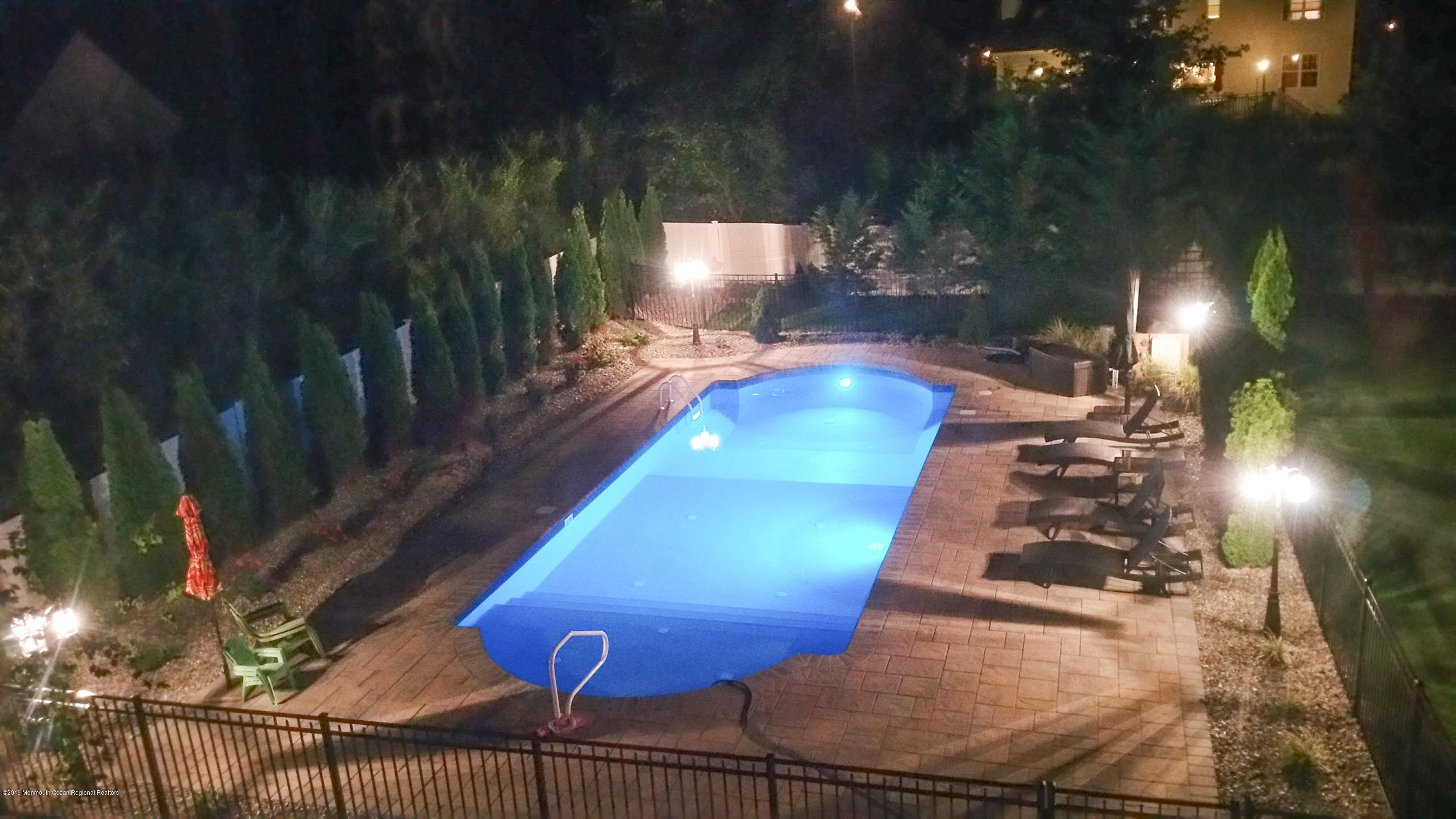 78 Station Road Morganville, NJ 07751 - Photo 34 of 40 Pool at Night