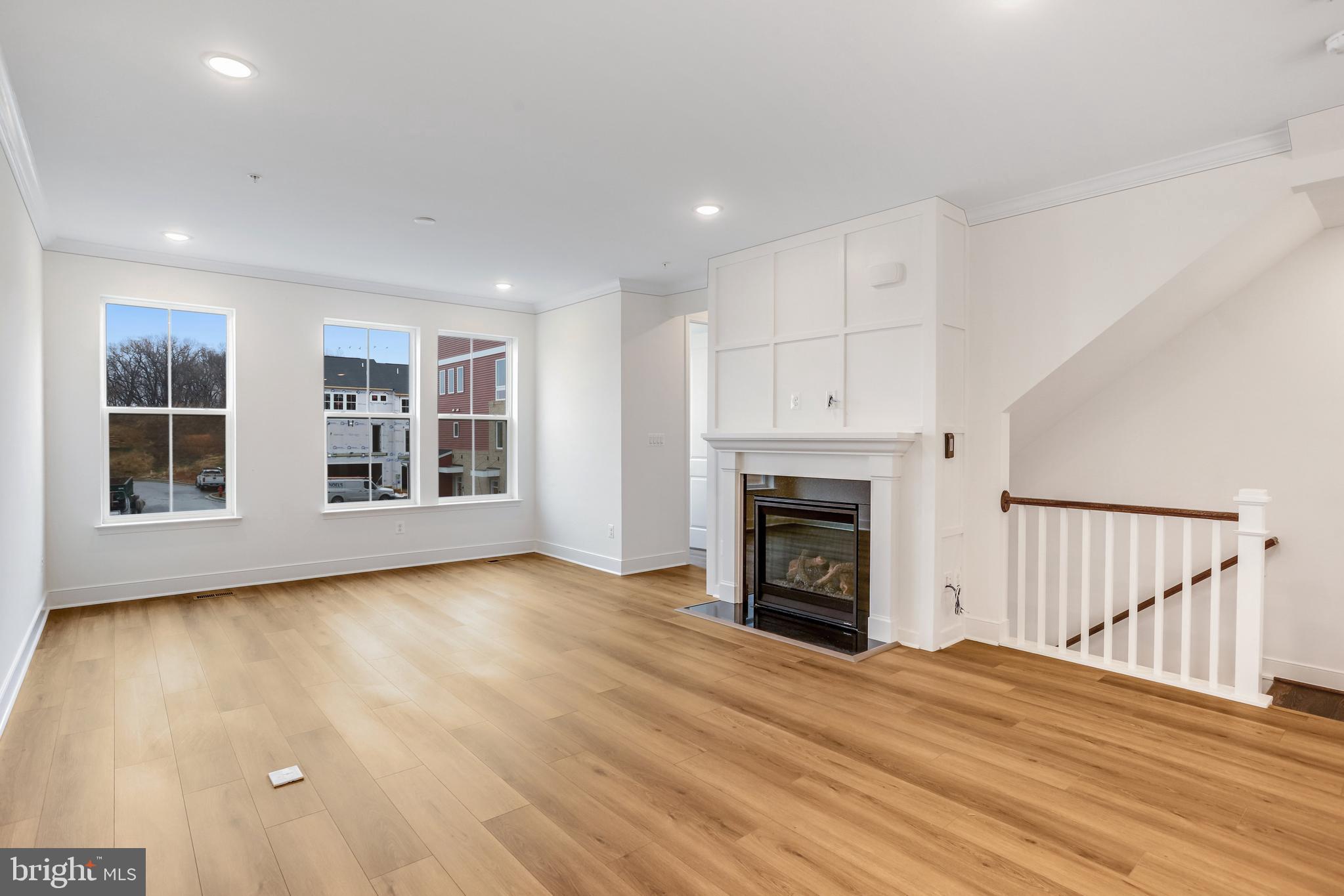 1885 Shookstown Road Frederick, MD 21702 - Photo 21 of 47 a view of a livingroom with a fireplace wooden floor and window