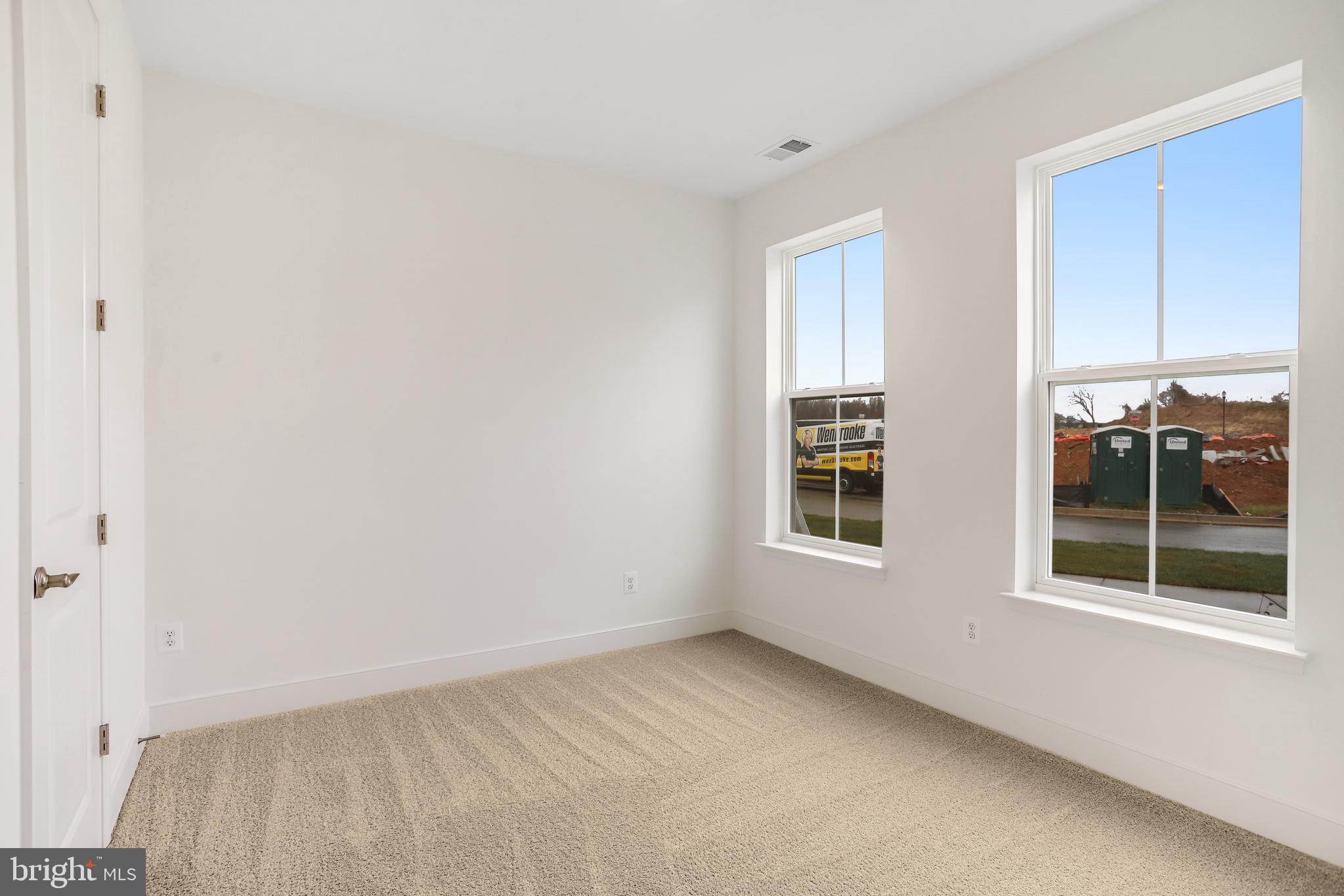 1885 Shookstown Road Frederick, MD 21702 - Photo 5 of 47 a view of an empty room with a window