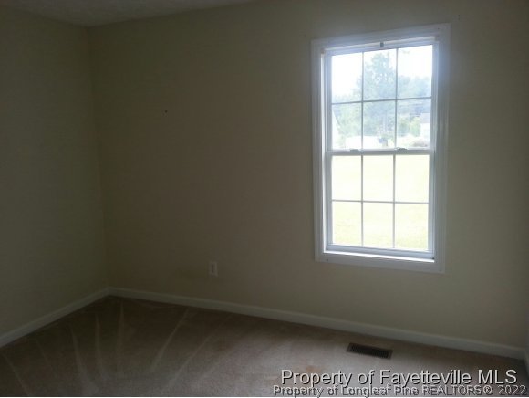 513 Kernstown Road Raeford, NC 28376 - Photo 14 of 24 an empty room with a window