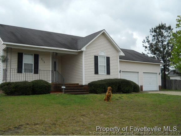 513 Kernstown Road Raeford, NC 28376 - Photo 17 of 24 a house view with a garden space