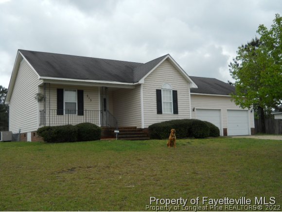 513 Kernstown Road Raeford, NC 28376 - Photo 21 of 24 a house that has a lot of windows in it