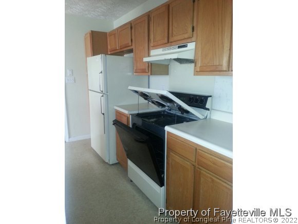 513 Kernstown Road Raeford, NC 28376 - Photo 5 of 24 a utility room with dryer and washer