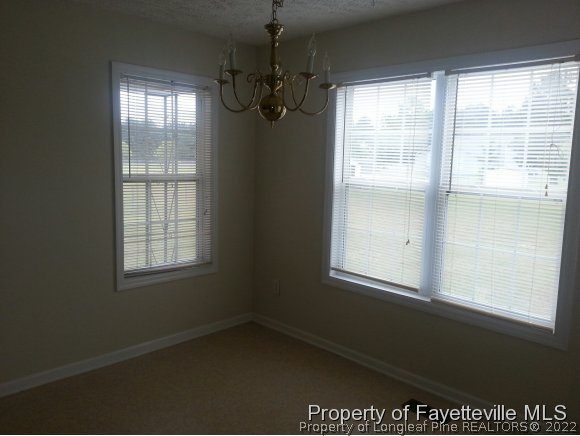 513 Kernstown Road Raeford, NC 28376 - Photo 7 of 24 an empty room with a window