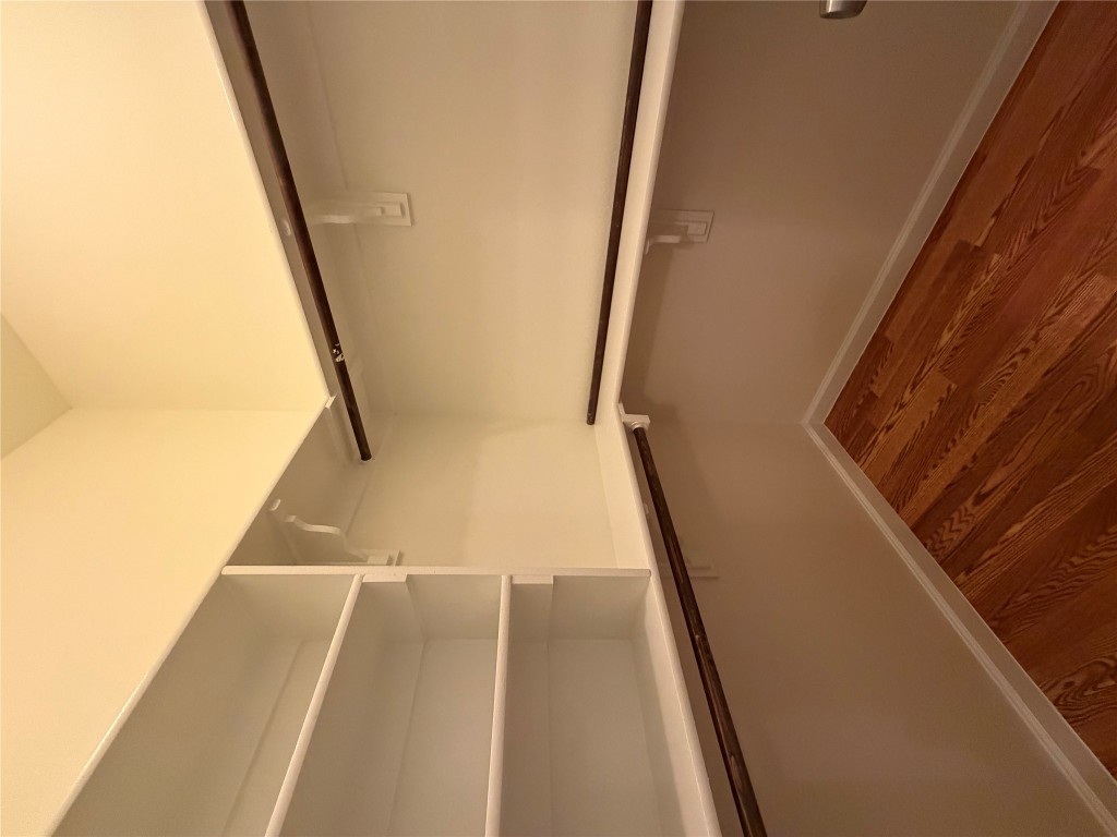 398 Mesa Drive, Unit C Del Valle, TX 78617 - Photo 18 of 21 a view of an empty walk in closet