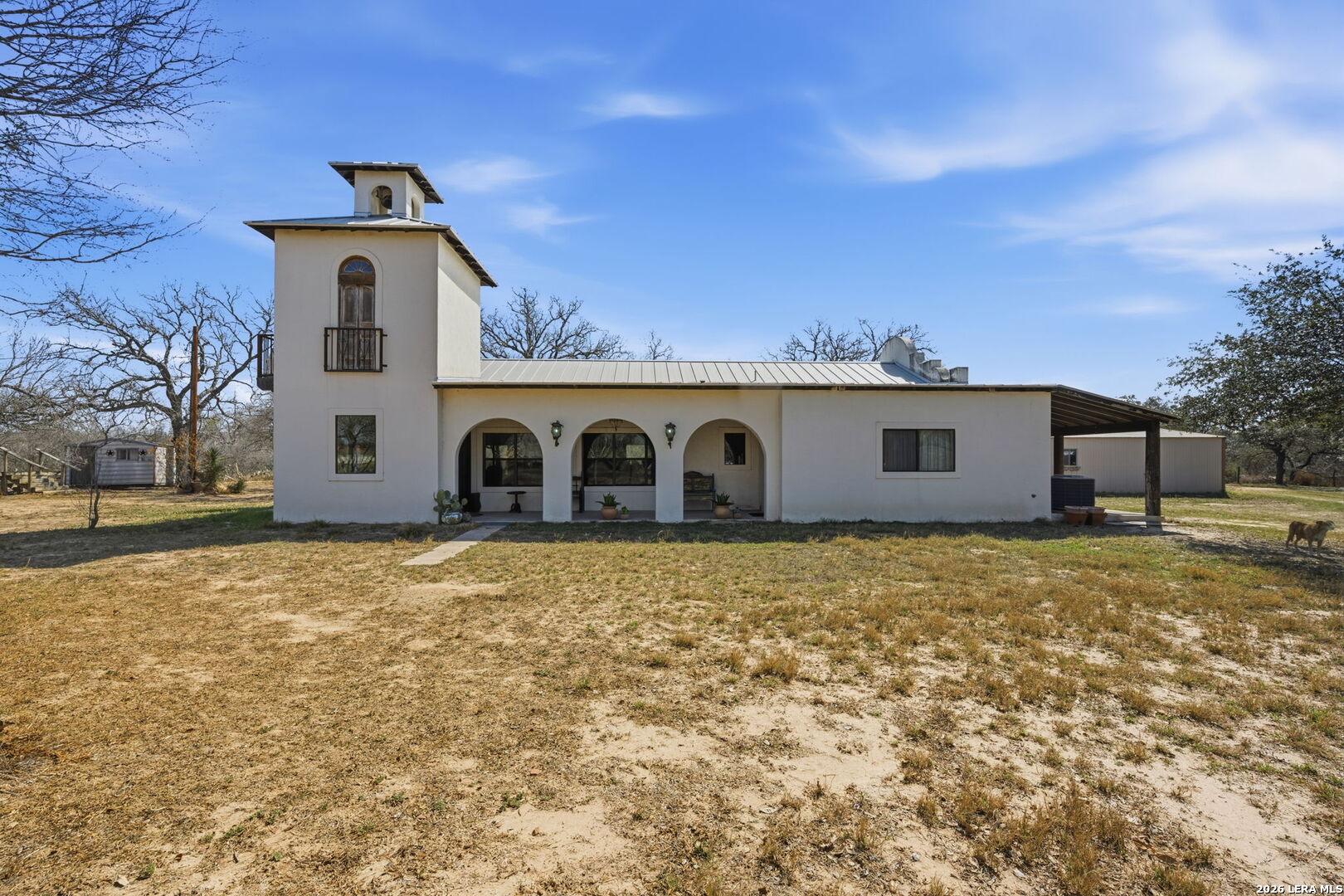 1150 Bruce Road Poteet, TX 78065 - Photo 4 of 33 a view of a yard with large trees