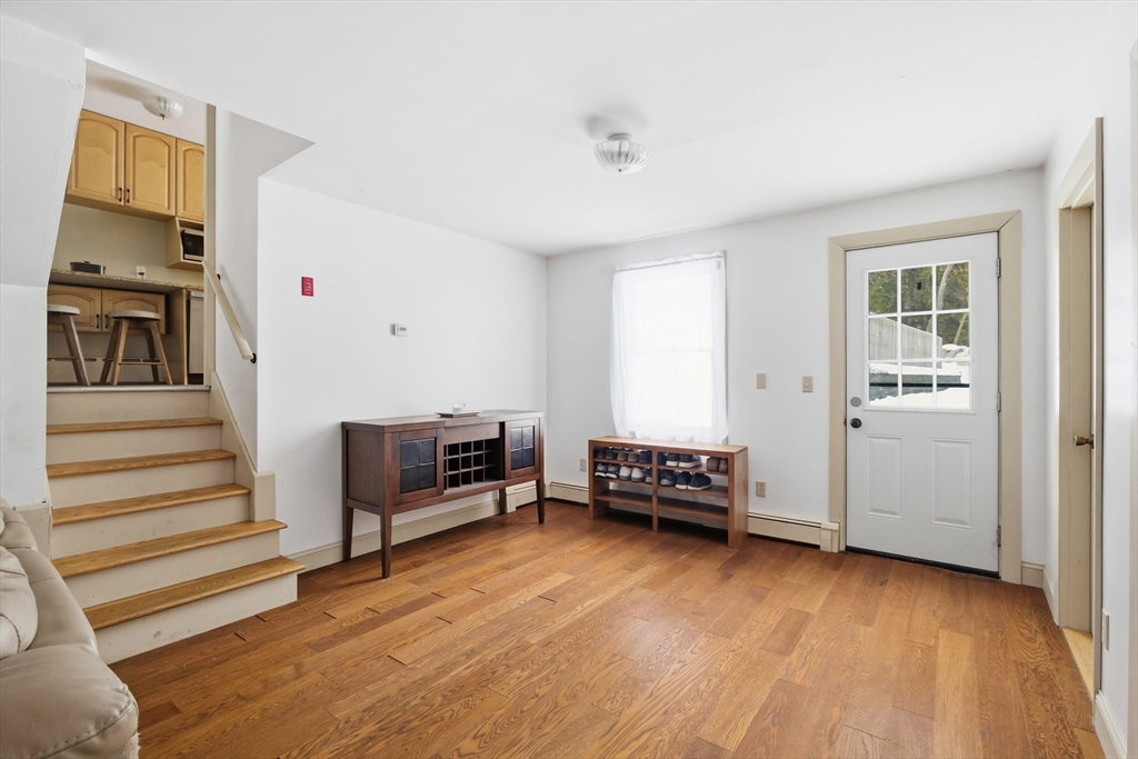 79 High Street Uxbridge, MA 01569 - Photo 11 of 35 a living room with furniture and wooden floor