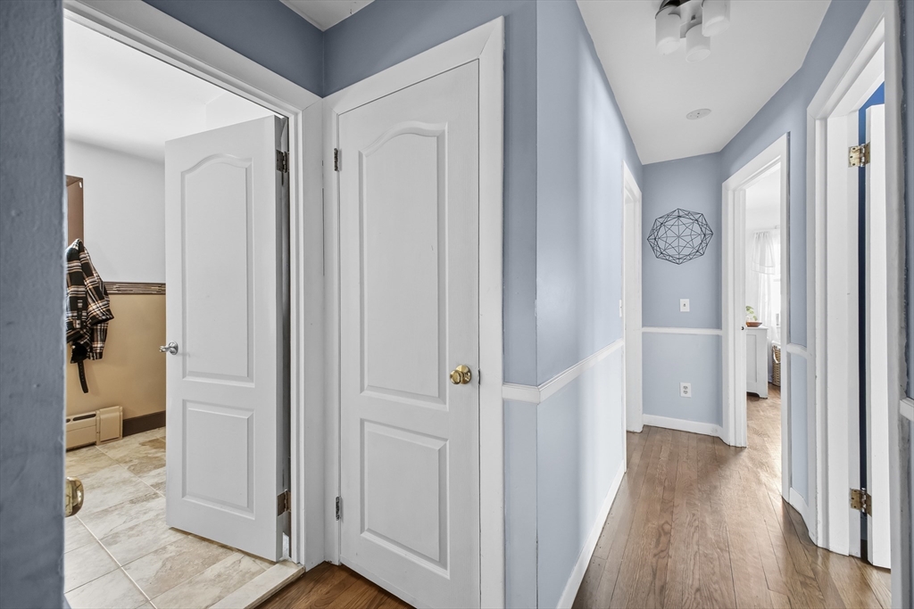 79 High Street Uxbridge, MA 01569 - Photo 15 of 35 a view of a hallway with a wooden door