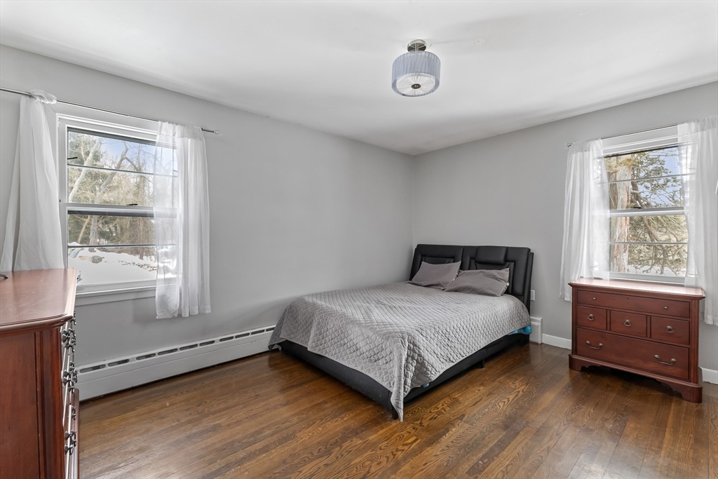 79 High Street Uxbridge, MA 01569 - Photo 19 of 35 a bedroom with a bed and window