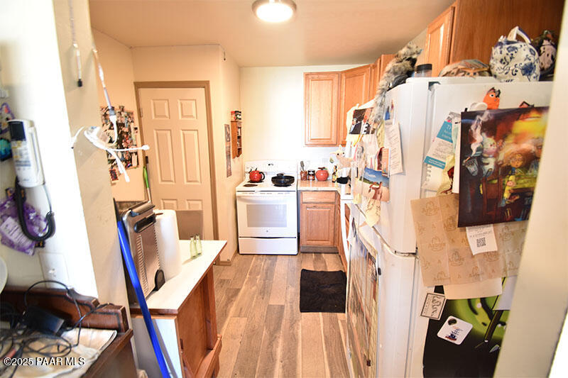 3200 North Victor Road Prescott Valley, AZ 86314 - Photo 20 of 30 a view of a living room with furniture and a flat screen tv