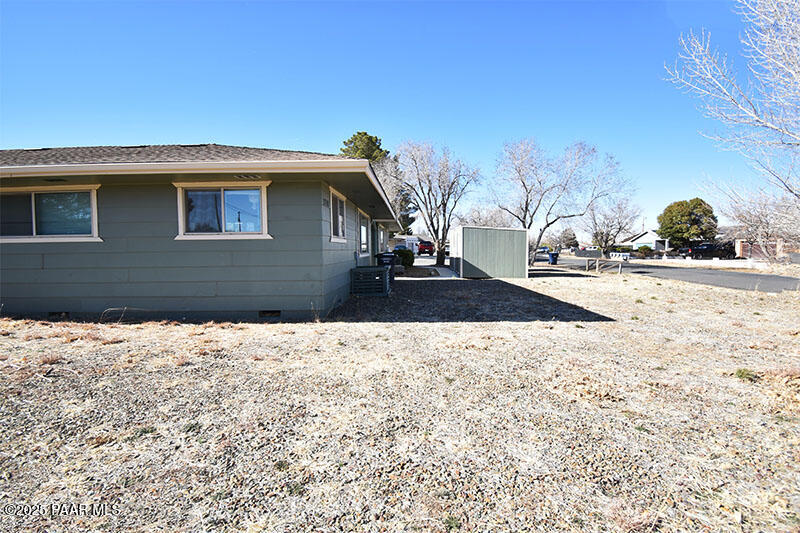 3200 North Victor Road Prescott Valley, AZ 86314 - Photo 4 of 30 a front view of a house with a yard
