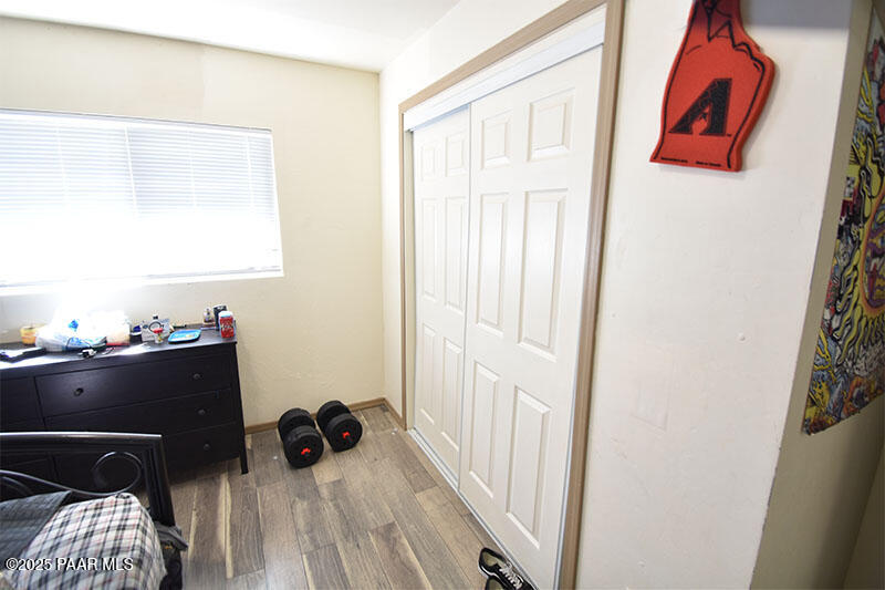 3200 North Victor Road Prescott Valley, AZ 86314 - Photo 9 of 30 a bedroom with a bed and a window