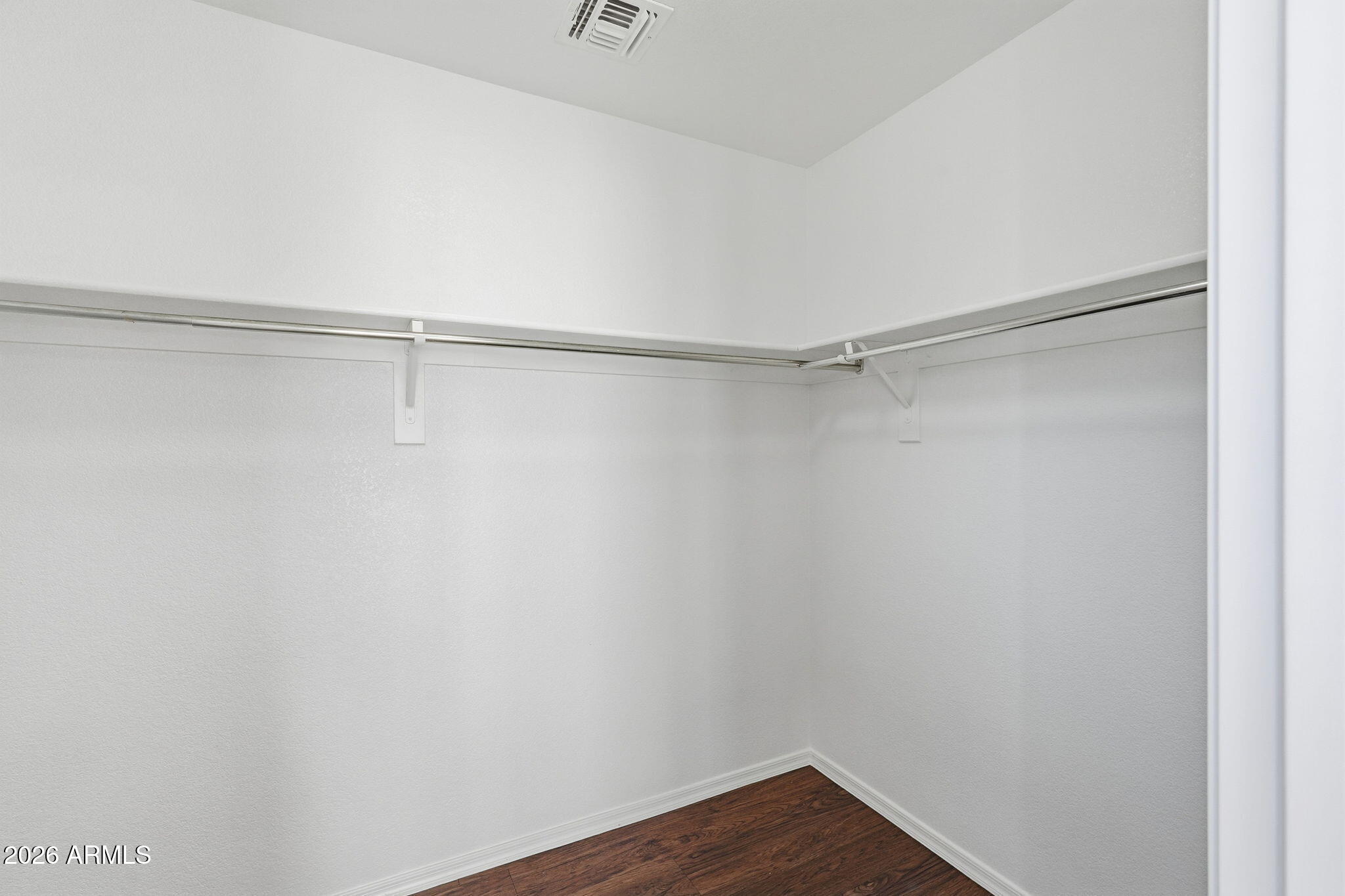 211 East Valley View Drive Phoenix, AZ 85042 - Photo 28 of 47 a view of an empty walk in closet