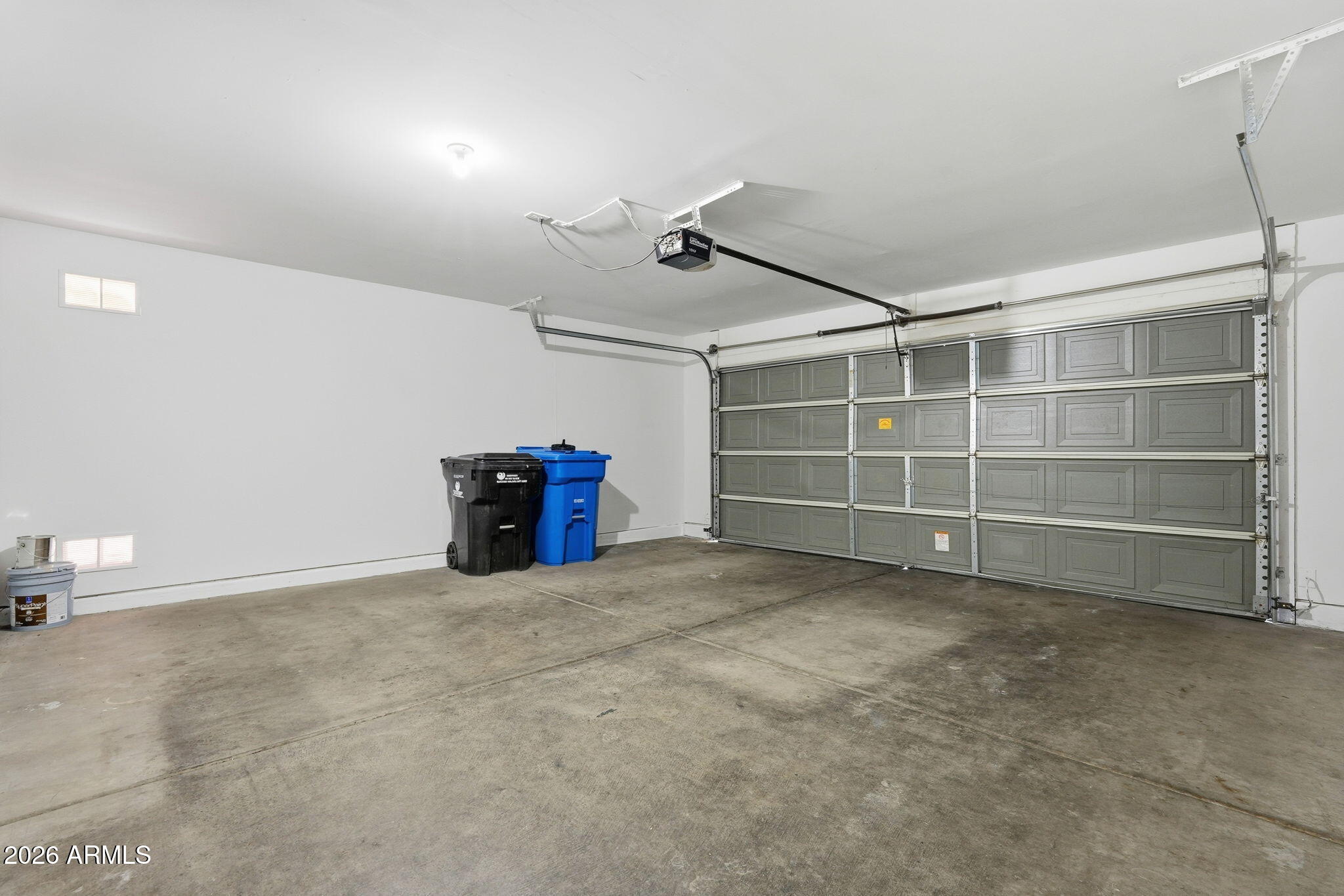 211 East Valley View Drive Phoenix, AZ 85042 - Photo 34 of 47 a view of an empty room with a garage