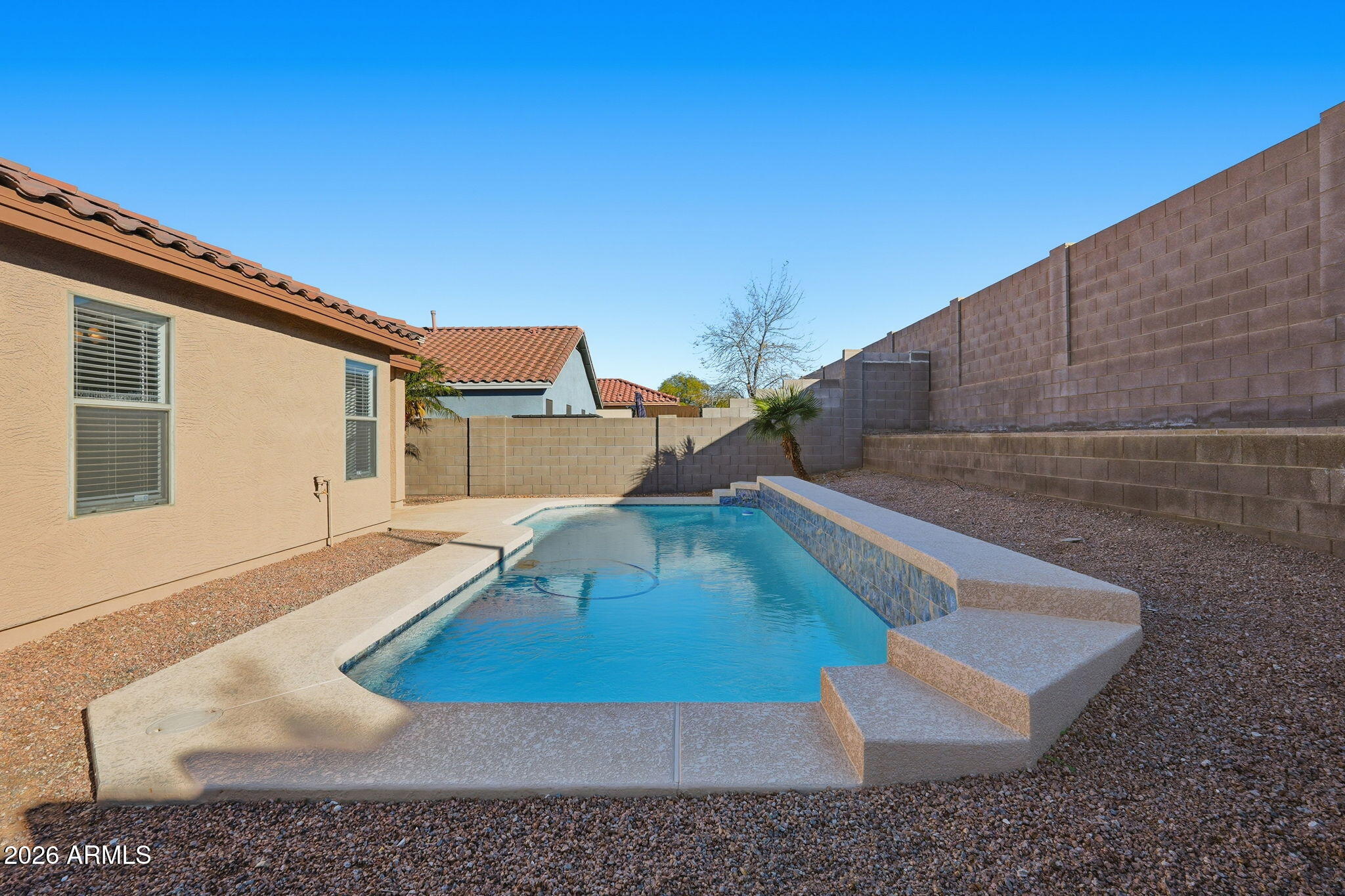 211 East Valley View Drive Phoenix, AZ 85042 - Photo 45 of 47 a view of a house with a backyard