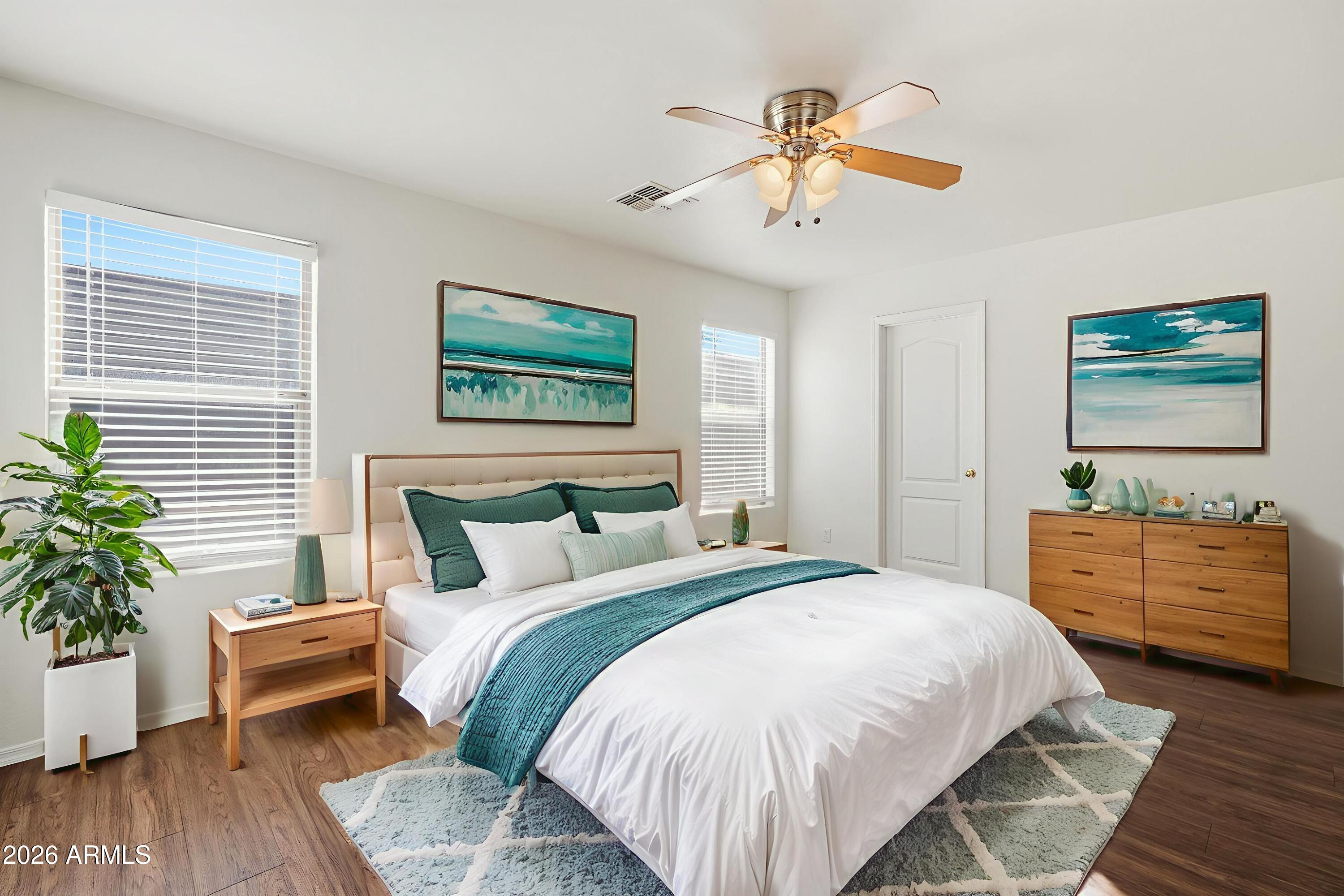 211 East Valley View Drive Phoenix, AZ 85042 - Photo 7 of 47 a bed room with a bed and a window