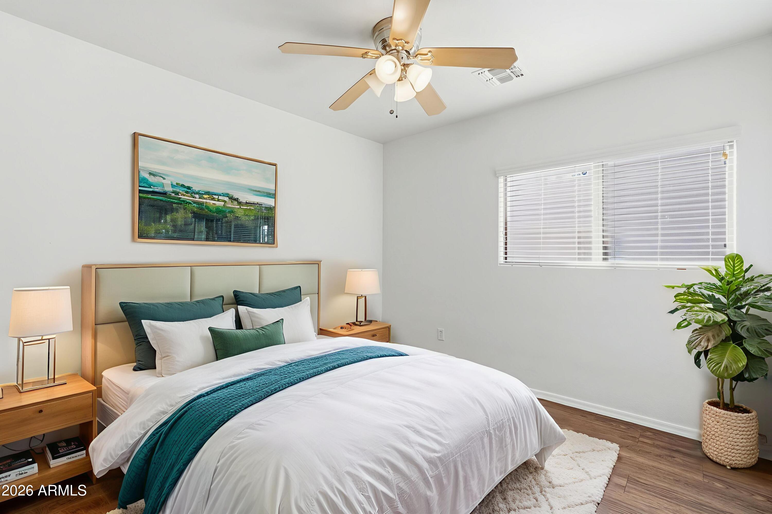 211 East Valley View Drive Phoenix, AZ 85042 - Photo 8 of 47 a bedroom with bed and window